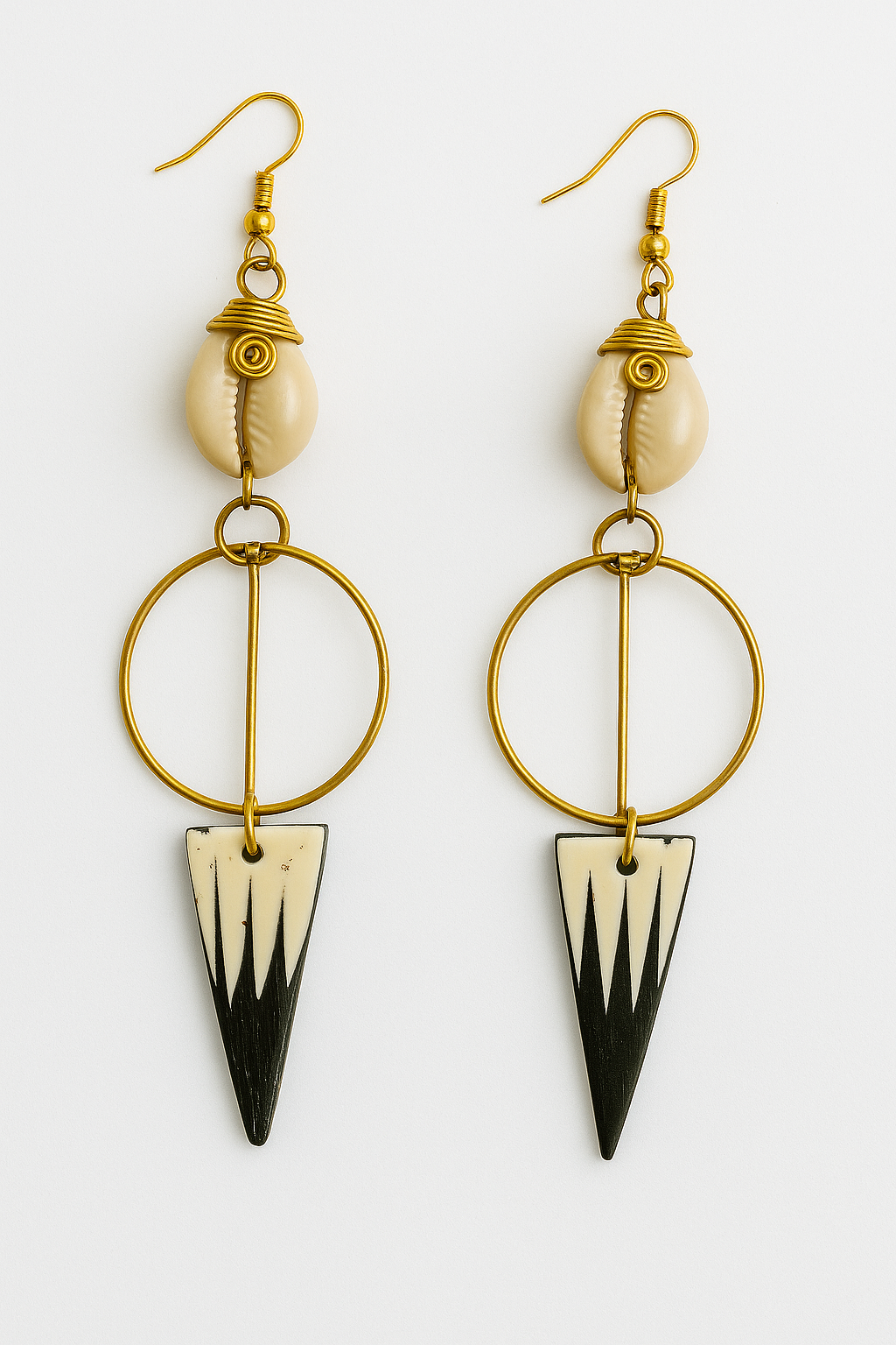 Brass cowrie bone earring